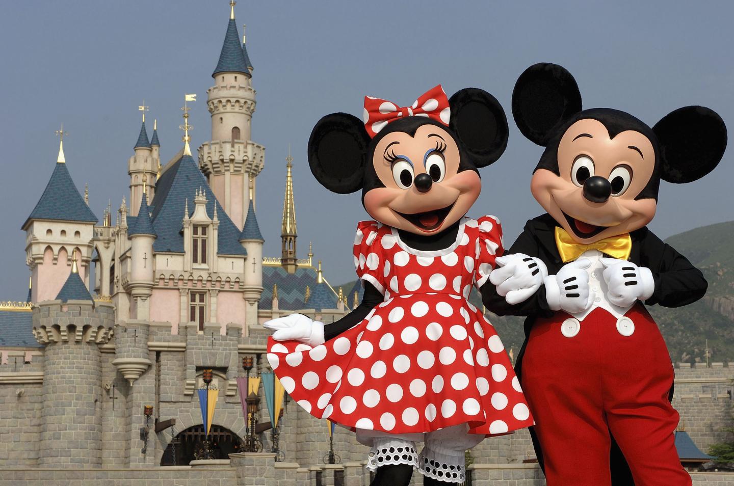 In a photo taken Sept. 1, 2005, Mickey Mouse and Minnie Mouse are seen in front of Sleeping Beauty Castle at Hong Kong Disneyland Park.  The new theme park and vacation resort will officially open Sept. 12, 2005.  Hong Kong Disneyland Resort is a family entertainment and recreation center consisting of a full-day, Disneyland-style theme park, two Disney hotels and a lakeside recreation center. (Mark Ashman, photographer)