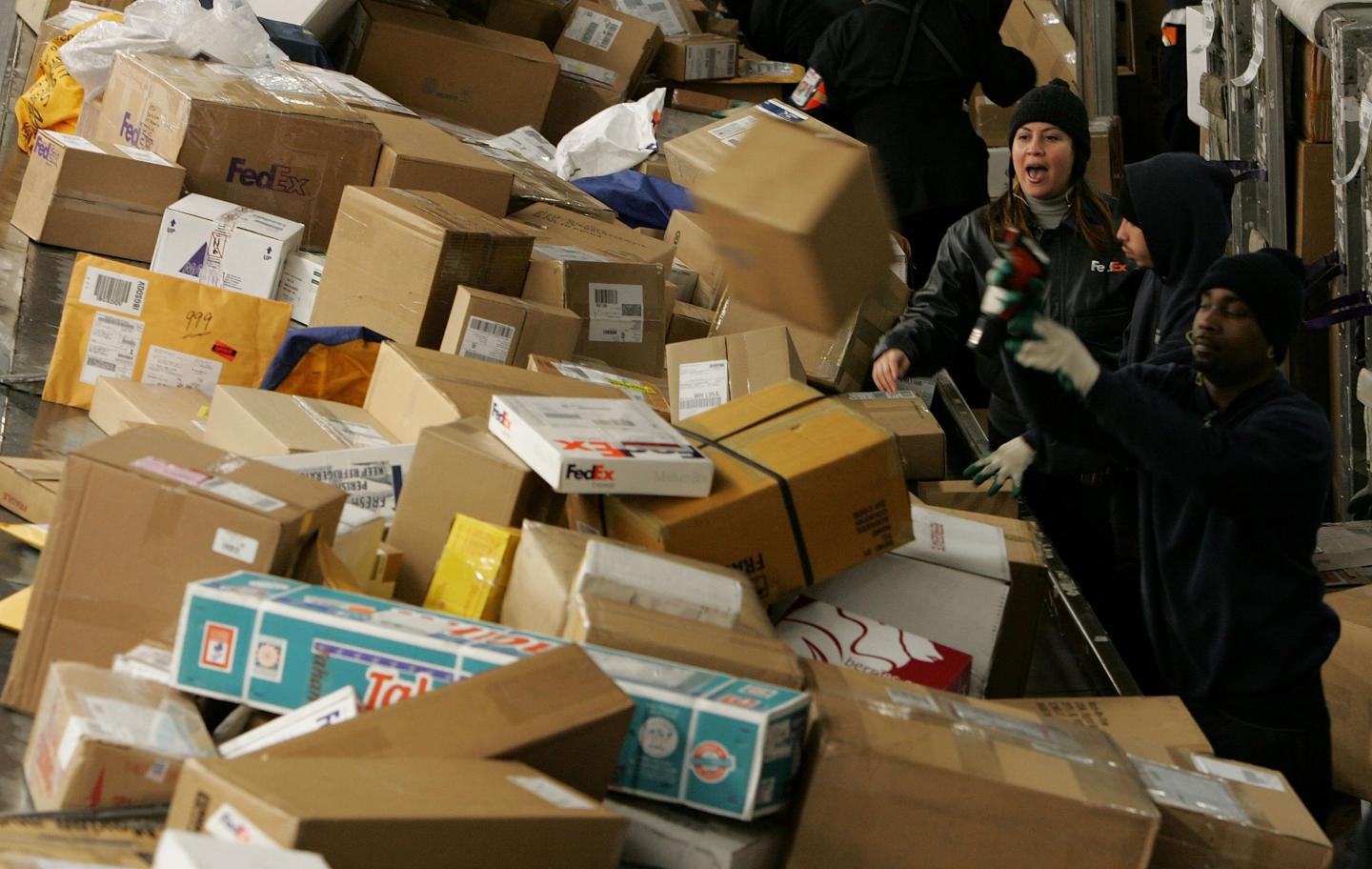 Fed Ex Estimates Record Day For Shipping