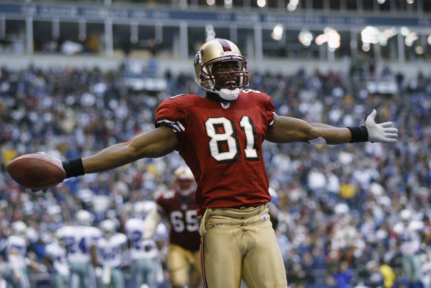 Owens celebrates a touchdown