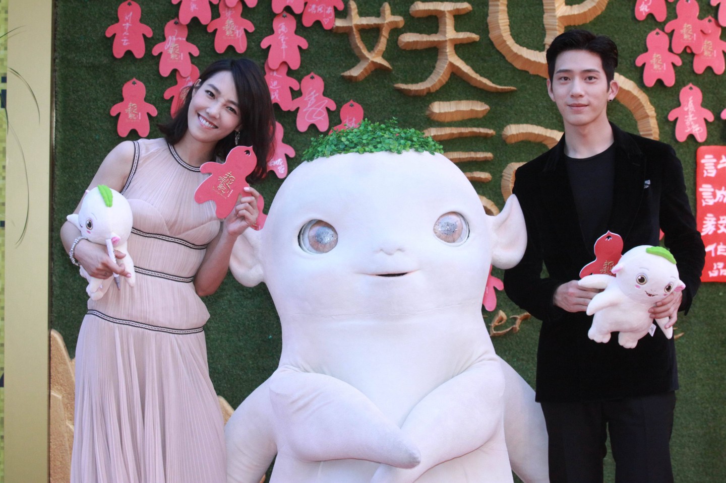 BEIJING, CHINA - JULY 5: (CHINA OUT) Actress Bai Baihe and actor Jing Boran arrive at the red carpet for the premiere of new film "Monster Hunt" directed by Xu Chengyi on July 5, 2015 in Beijing, China. (Photo by ChinaFotoPress)***_***