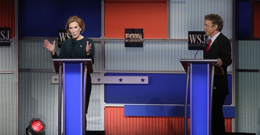 Republican presidential candidates Carly Fiorina (L) and Rand Paul (R) participate in the Republican Presidential Debate hosted by Fox Business and The Wall Street Journal November 10, 2015 in Milwaukee, Wisconsin
