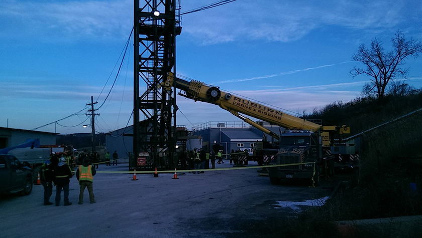 The Ithaca Fire Department uses a crane to lift miners from the Cargill salt mine in Lansing