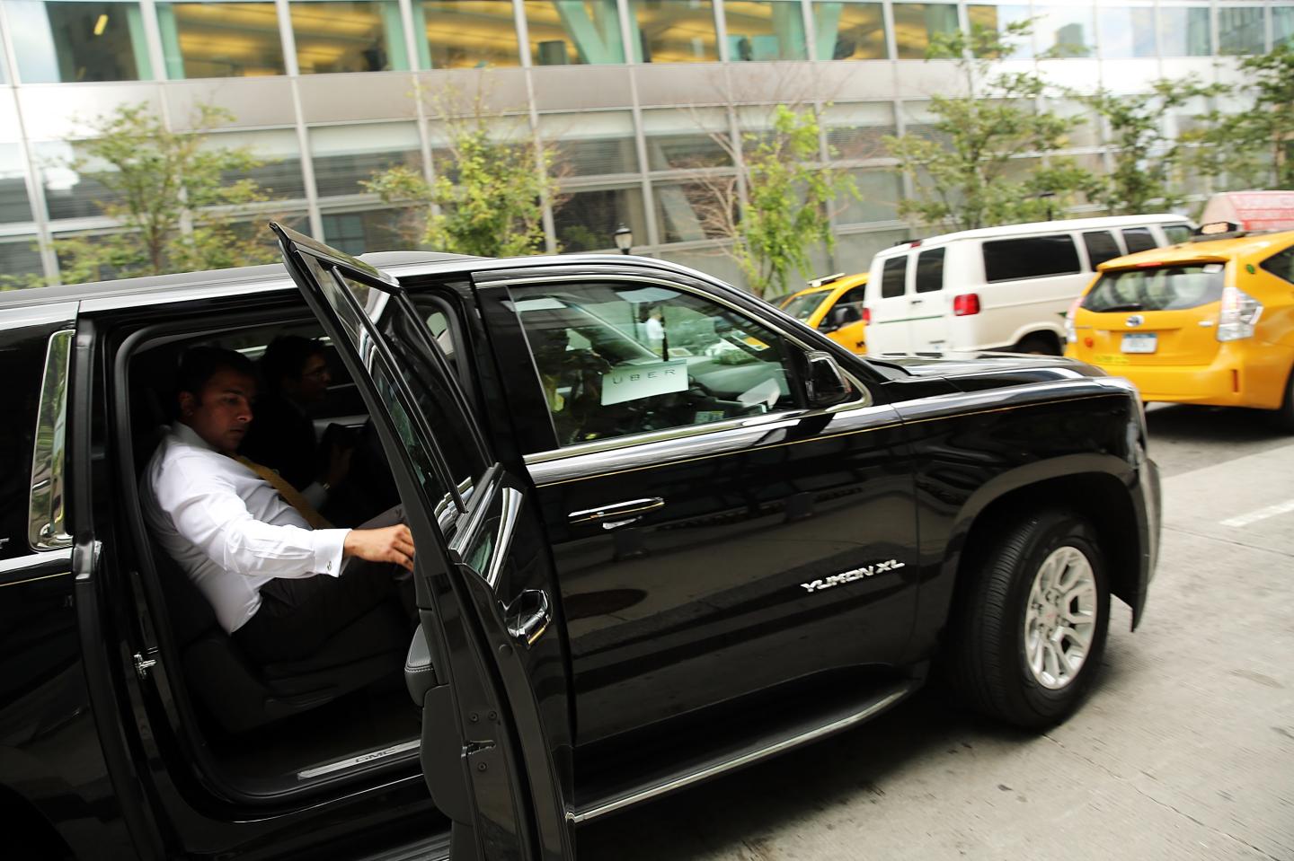 An Uber drops off a passenger in New York City in July 2015.