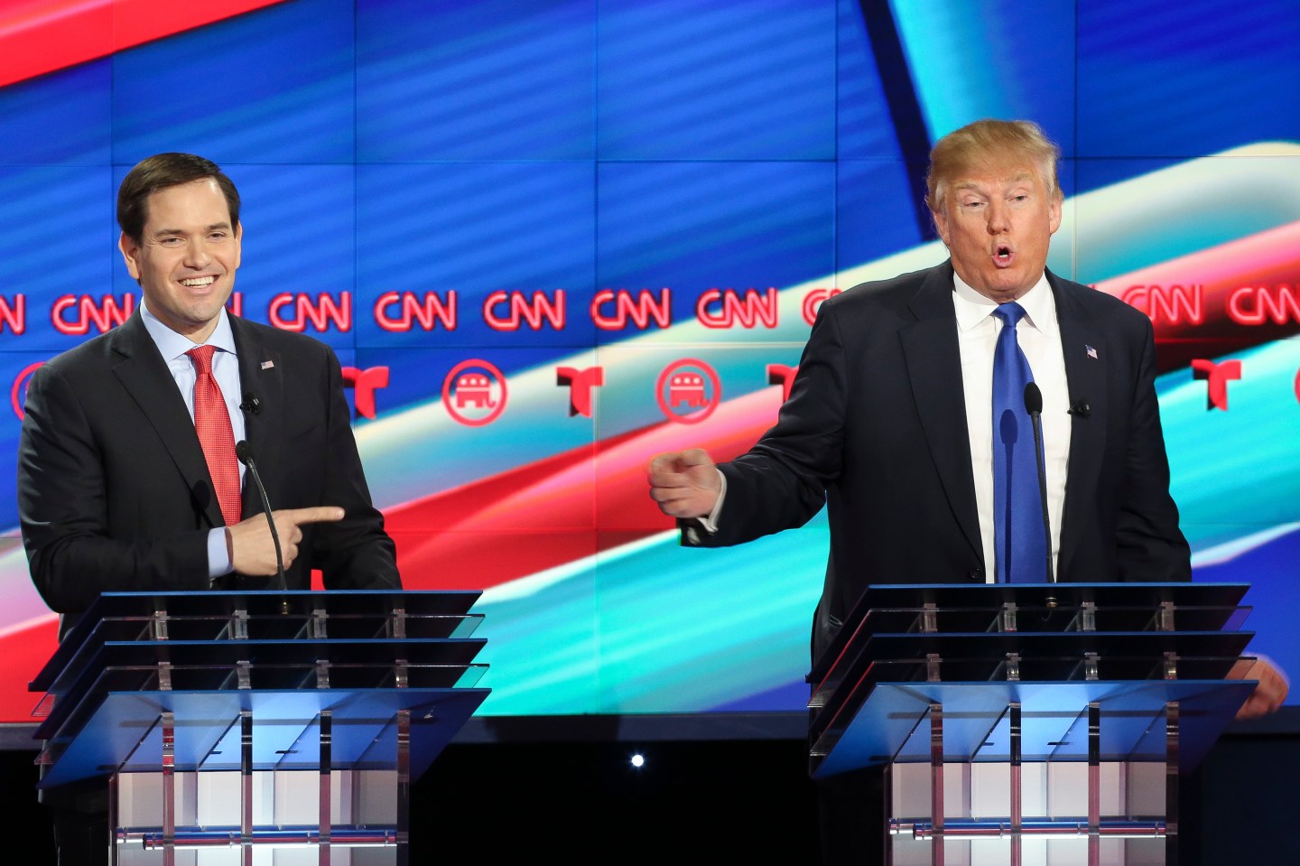 Marco Rubio, left, listens as Donald Trump answers a question during the Republican Presidential Primary Debate at the University of Houston Thursday, Feb. 25, 2016. ( Gary Coronado / Houston Chronicle )