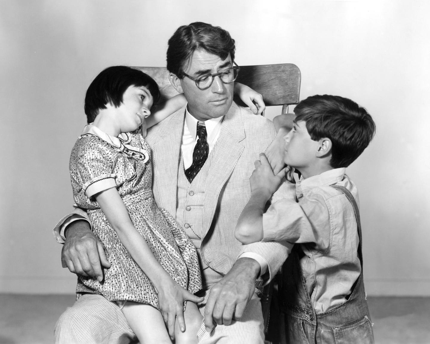 Gregory Peck as Atticus Finch, Mary Badham as Jean Louise 'Scout' Finch and Phillip Alford as Jeremy 'Jem' Finch in To Kill a Mockingbird