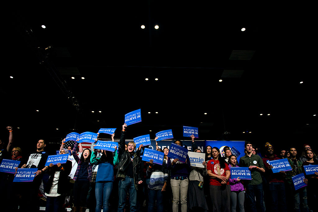 MINNEAPOLIS, MN- FEBRUARY 29: Supporters of Democratic presidential candidate Sen. Bernie Sanders (D-VT) wave signs during a campaign rally at the Minneapolis Convention CenterFebruary 29, 2016 in Minneapolis, Minnesota. Sanders, who has spent the last four days campaigning in Minnesota, is hoping to win the State in the Super Tuesday primary election on March 1st, 2016. (Photo by Stephen Maturen/Getty Images)