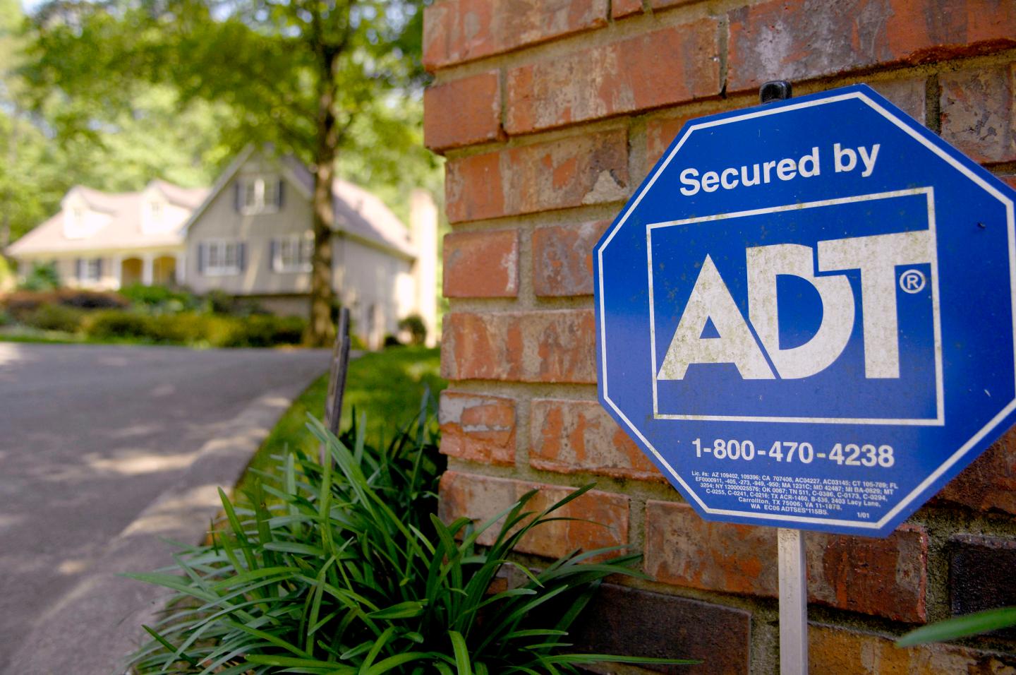 An ADT Security sign sits out in front of a home in Sandy Sp
