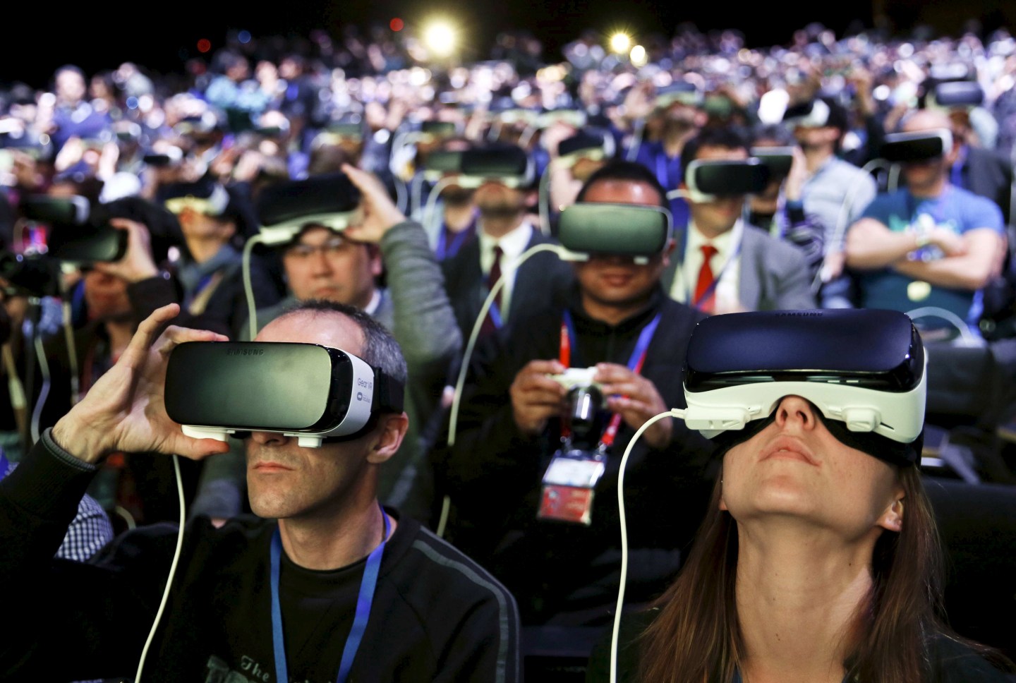 People wear Samsung Gear VR devices as they attend the launching ceremony of new Samsung S7 and S7 edge smartphones during the Mobile World Congress in Barcelona