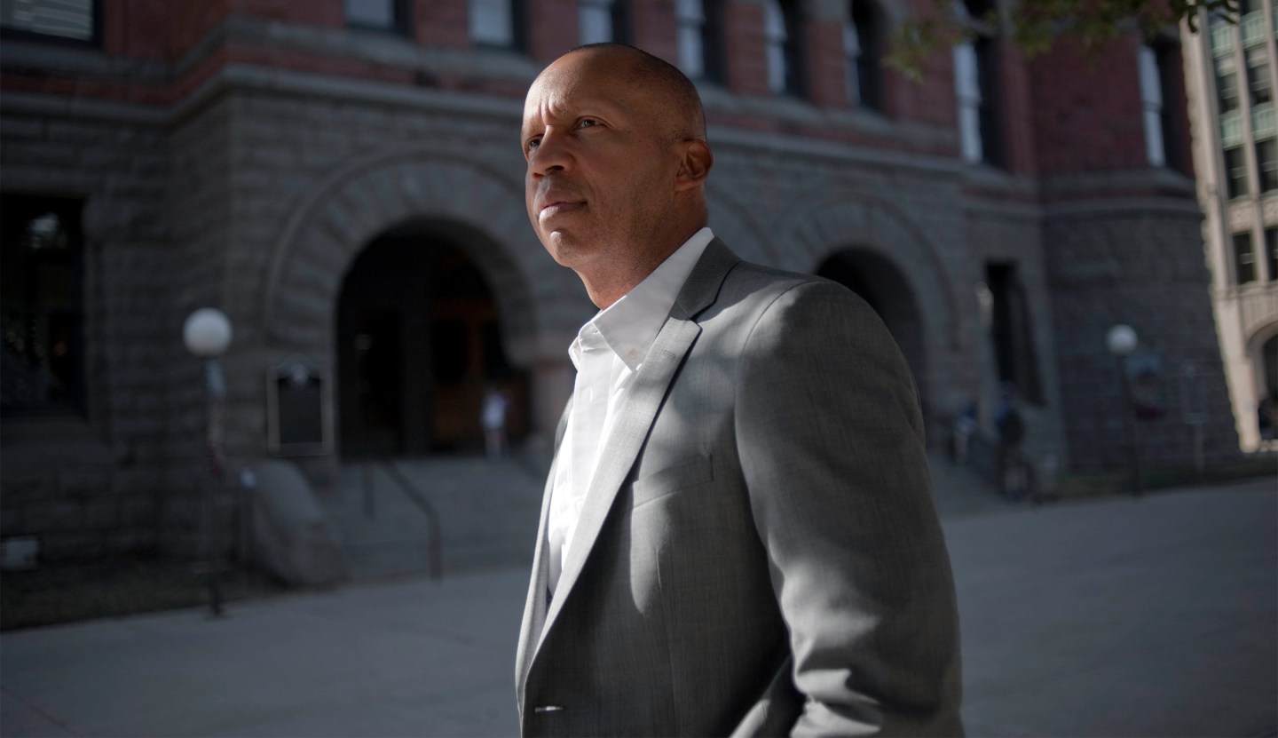 Bryan Stevenson, who founded and runs the Equal Justice Initiative, in front of the former courthouse where the 1910 lynching of Allen Brooks, a black man, began in Dallas.
