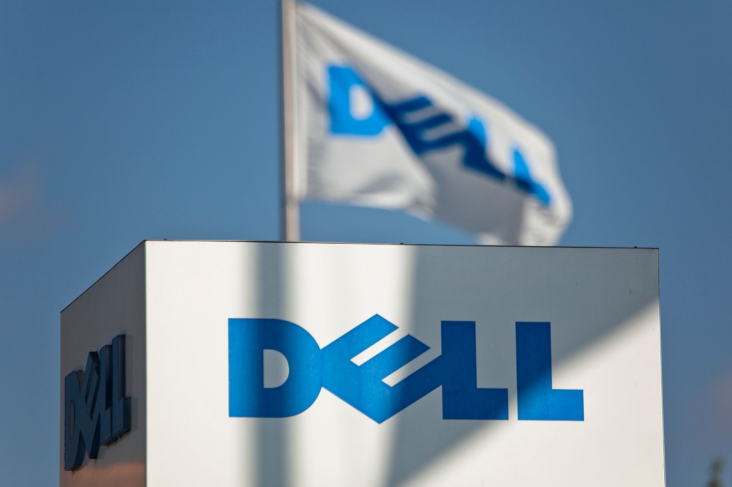A Dell flag flies on the headquarters campus of Dell Inc. in