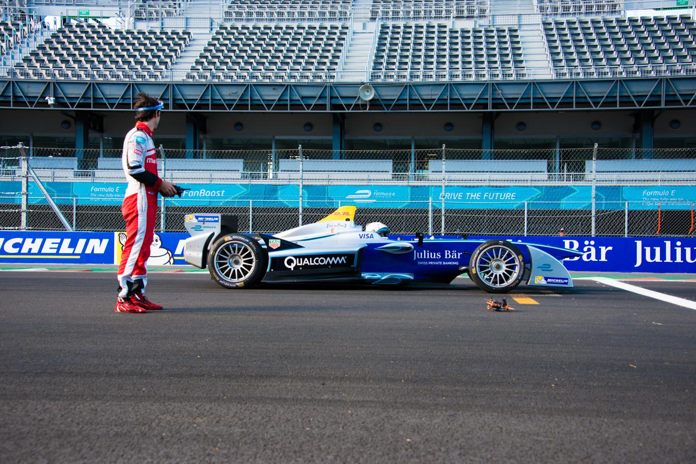Watch This Drone Take On a Formula E Race Car