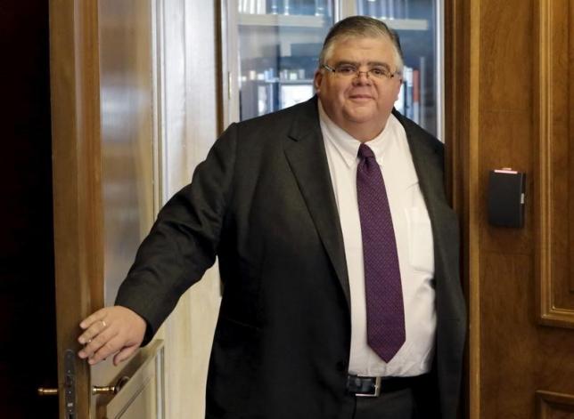 Mexico's Central Bank Governor Agustin Carstens arrives to attend an interview with Reuters in Mexico City
