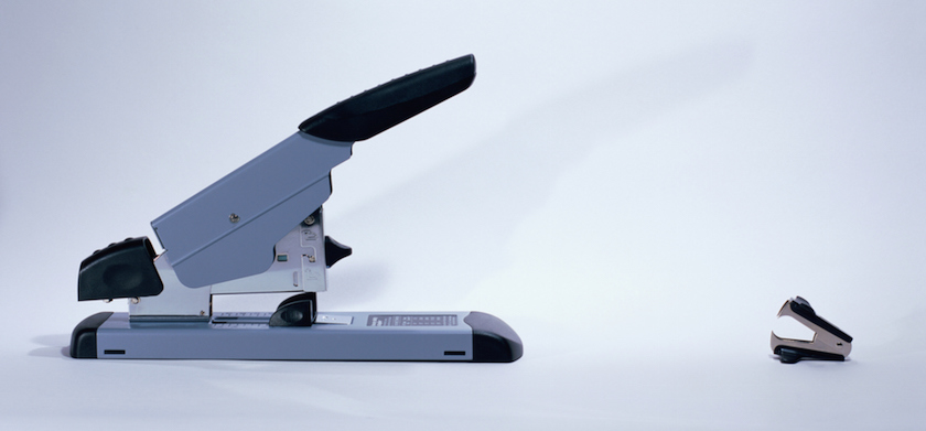Large stapler opposite staple remover