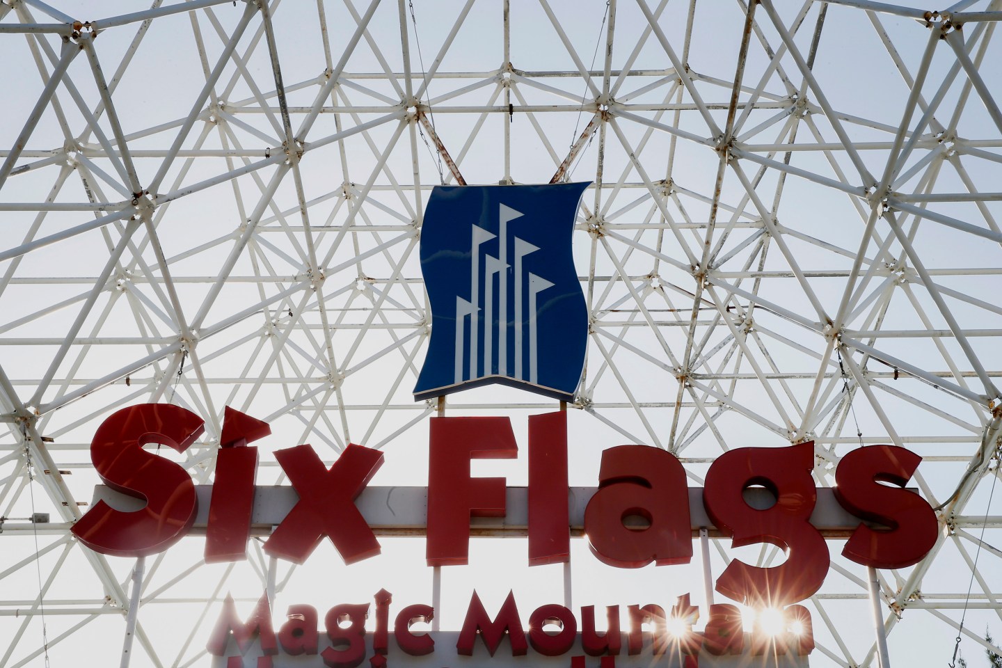 Signage is displayed at Six Flags Magic Mountain in Valencia, California, U.S., on Monday, April 20, 2015. Photographer: Patrick T. Fallon/Bloomberg
