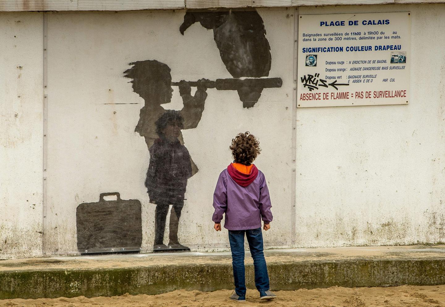 FRANCE-ART-BANSKY-BRITAIN-MIGRANTS-GRAFFITI