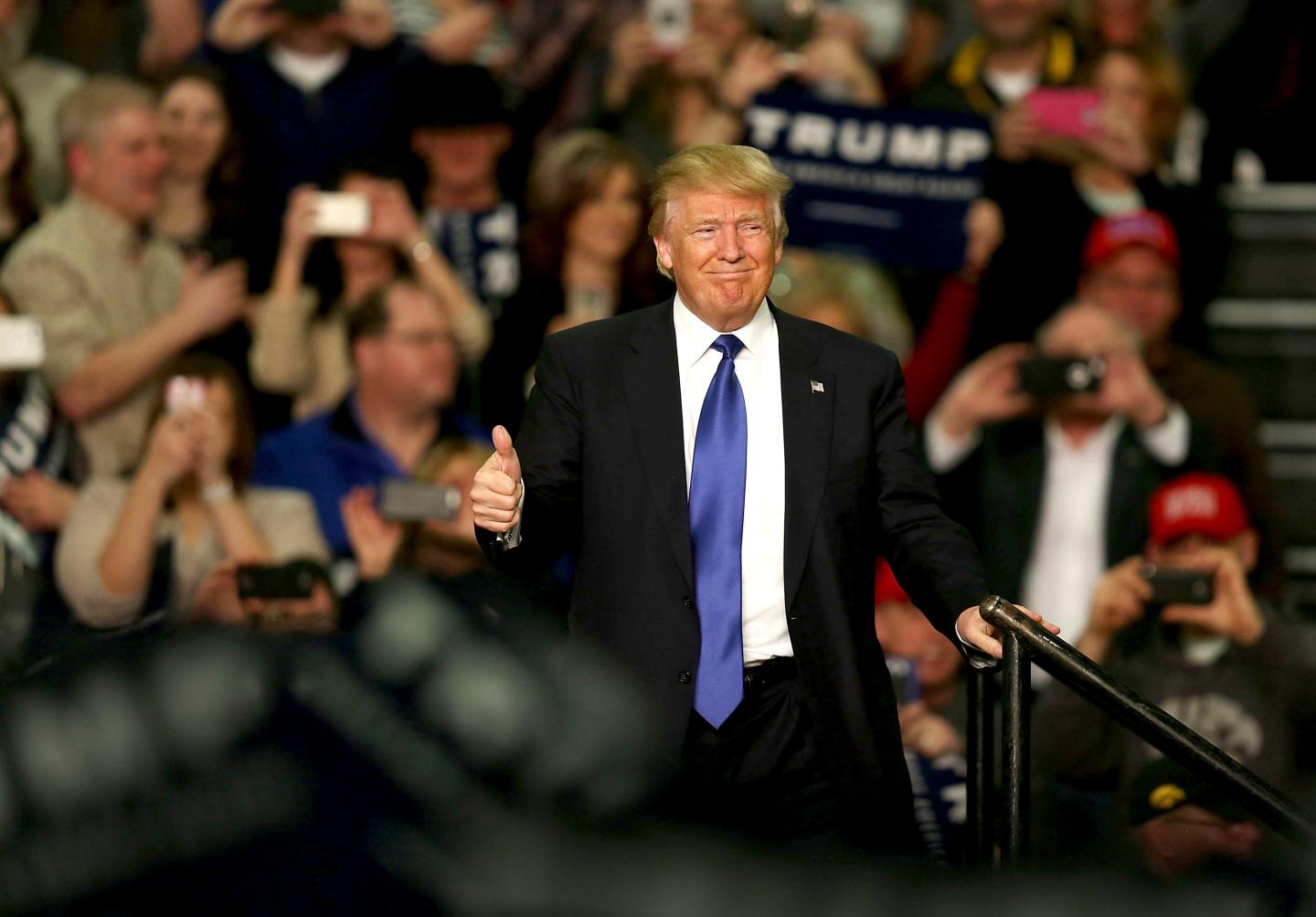 CLINTON, IA - JANUARY 30: Republican presidential candidateÊDonald TrumpÊarrives on stage for a campaign event at Clinton Middle School on January 30, 2016 in Clinton, Iowa. With two days to go before the Iowa caucuses, Trump continues his quest to become the Republican presidential nominee. (Photo by Joe Raedle/Getty Images)