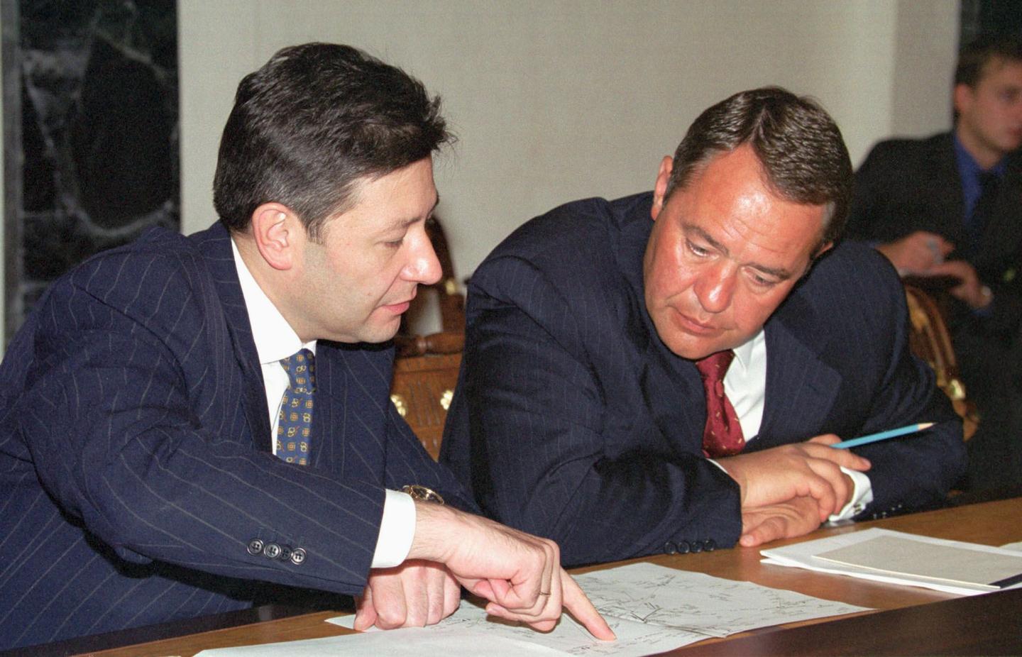 Telecommunication Minister Leonid Reiman (L) and M