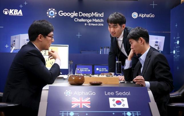 The world's top Go player Lee Sedol reviews the match after the fourth match of the Google DeepMind Challenge Match against Google's artificial intelligence program AlphaGo in Seoul