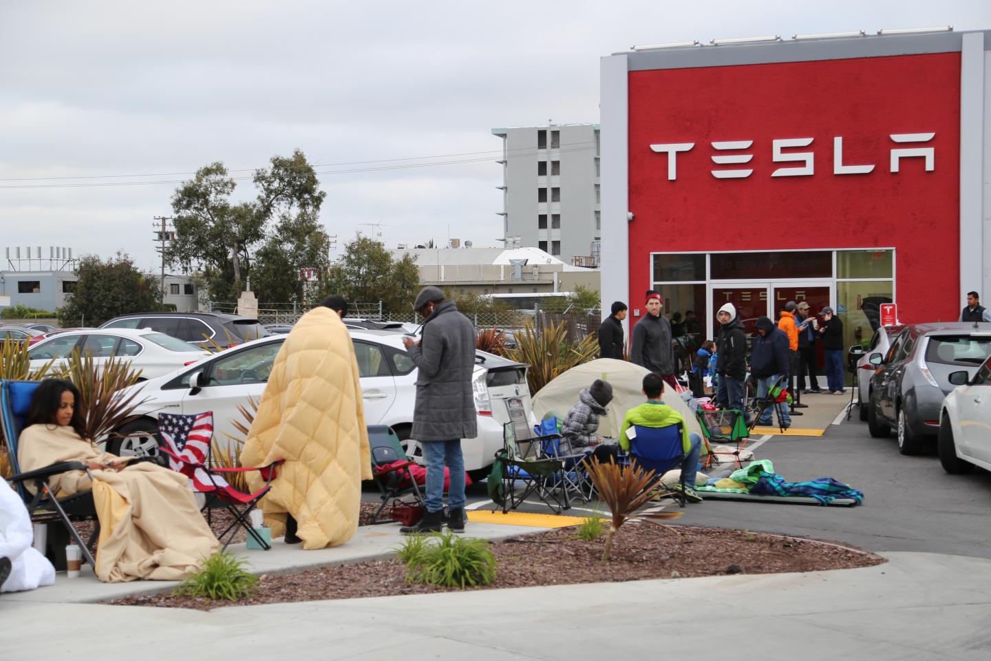 Tesla Fans Eagerly Camp and Wait for the Model 3