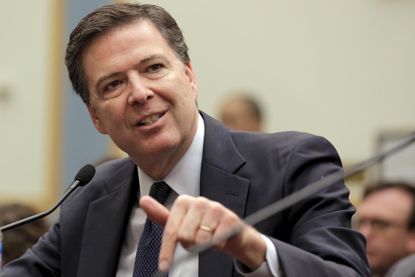 FBI Director James Comey testifies during a House Judiciary hearing on "The Encryption Tightrope: Balancing Americans' Security and Privacy" on Capitol Hill