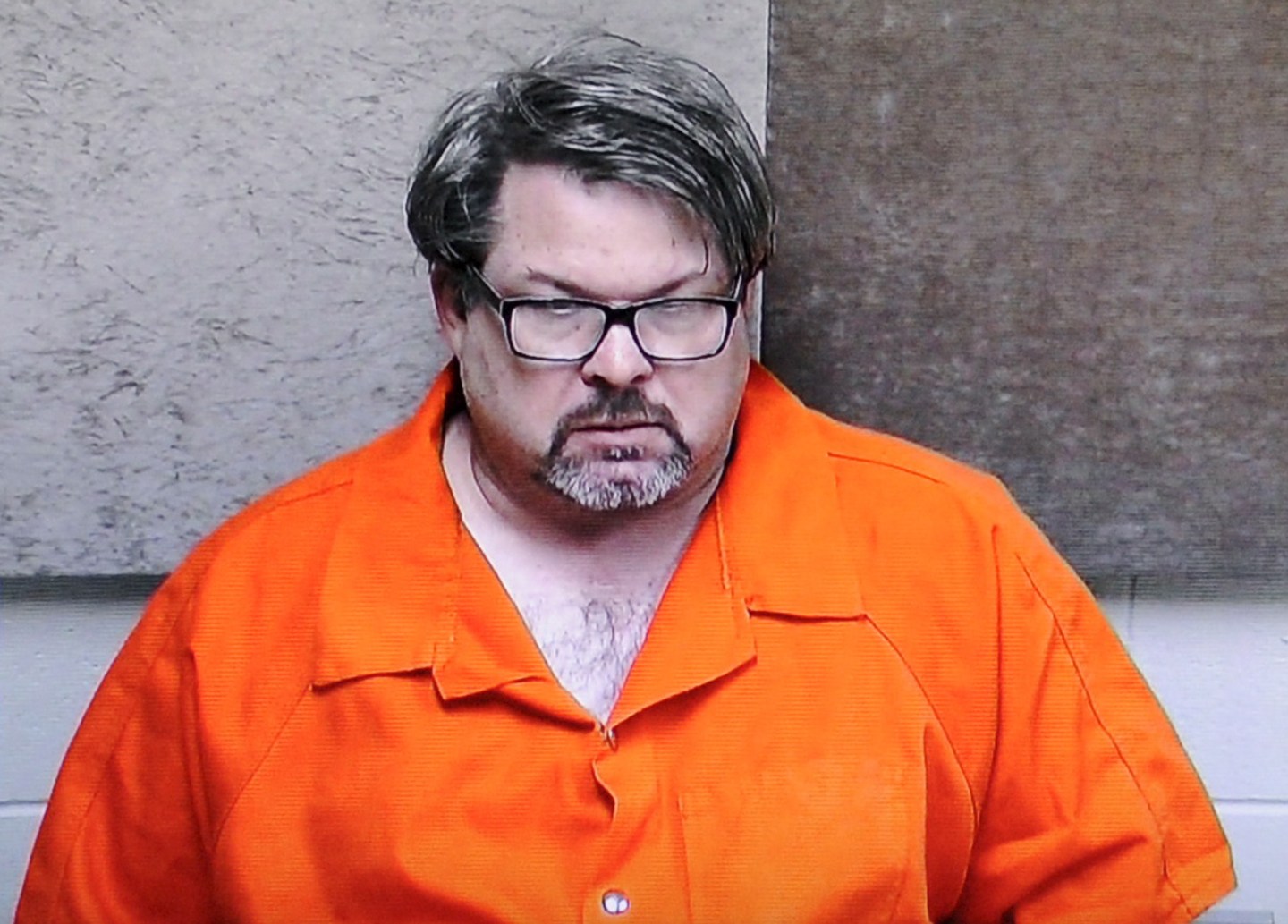Jason Dalton is seen on closed circuit television during his arraignment in Kalamazoo County