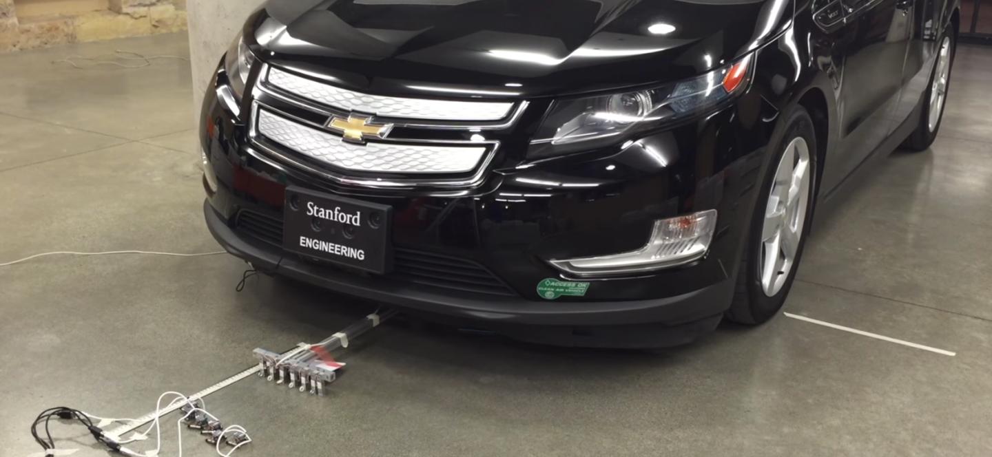 Watch This Team of Six Tiny Robots Move a Car
