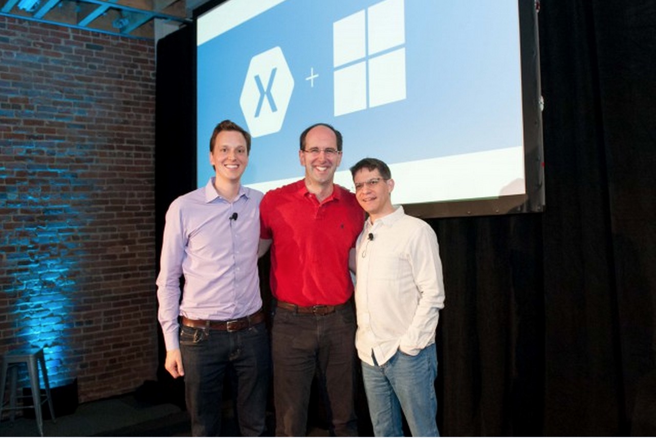 Microsoft Scott Guthrie flanked by Xamarin's Nat Friedman (l.) and Miguel de Icaza.