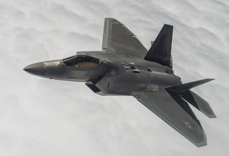 An F-22A Raptor from the 95th Fighter Squadron at Tyndall Air Force Base, Fla., flies over the Nevada Test and Training Range during Red Flag 15-3 at Nellis AFB, Nev., July 31, 2015.