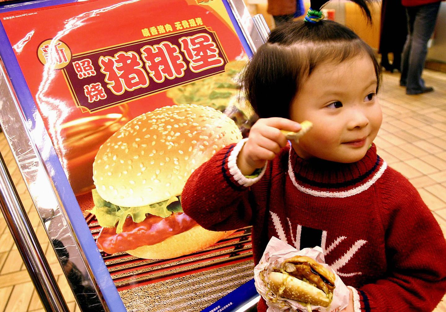 A young girl tries out the new US fastfo