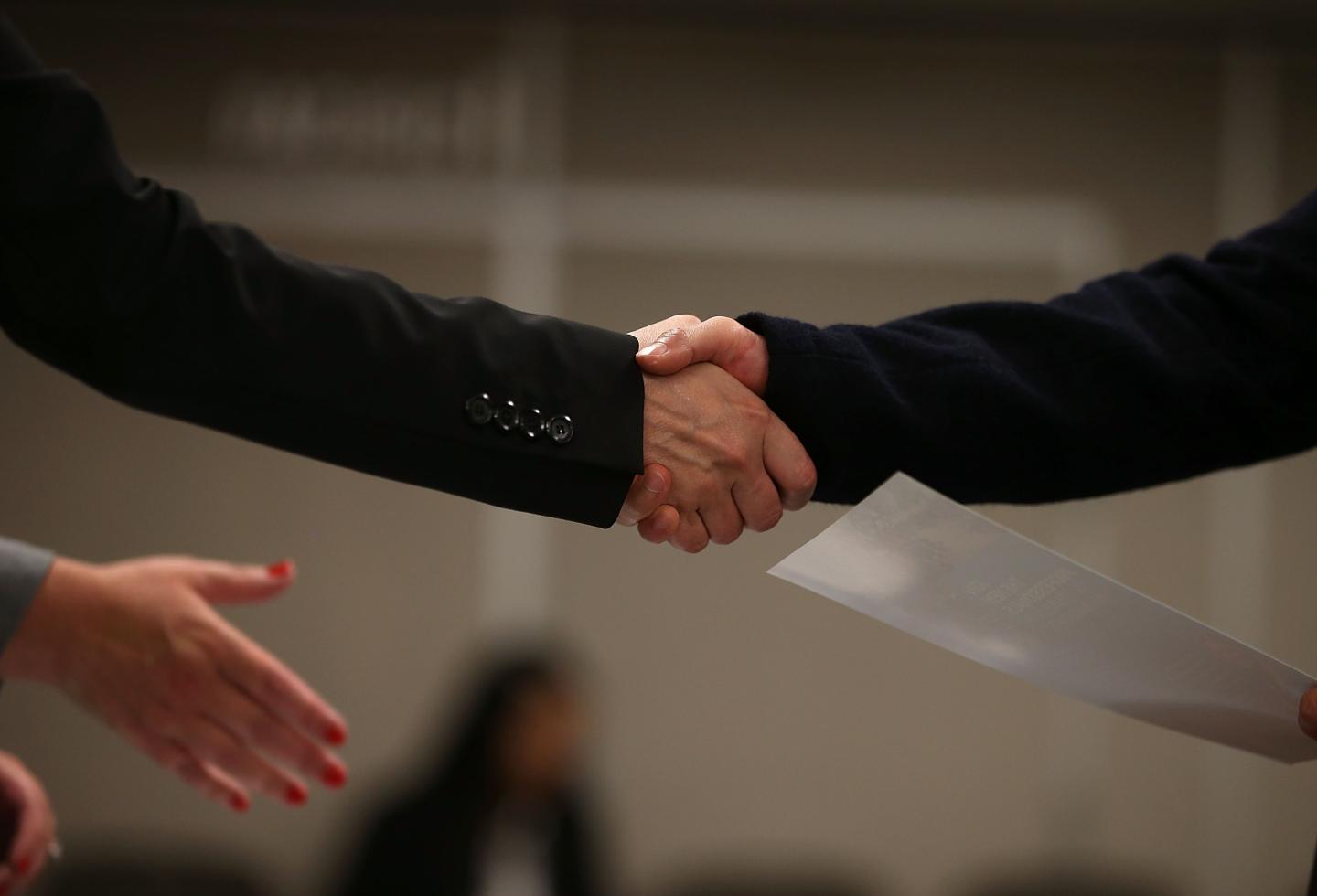 Job Seekers Apply For Open Positions At Career Fair In San Francisco
