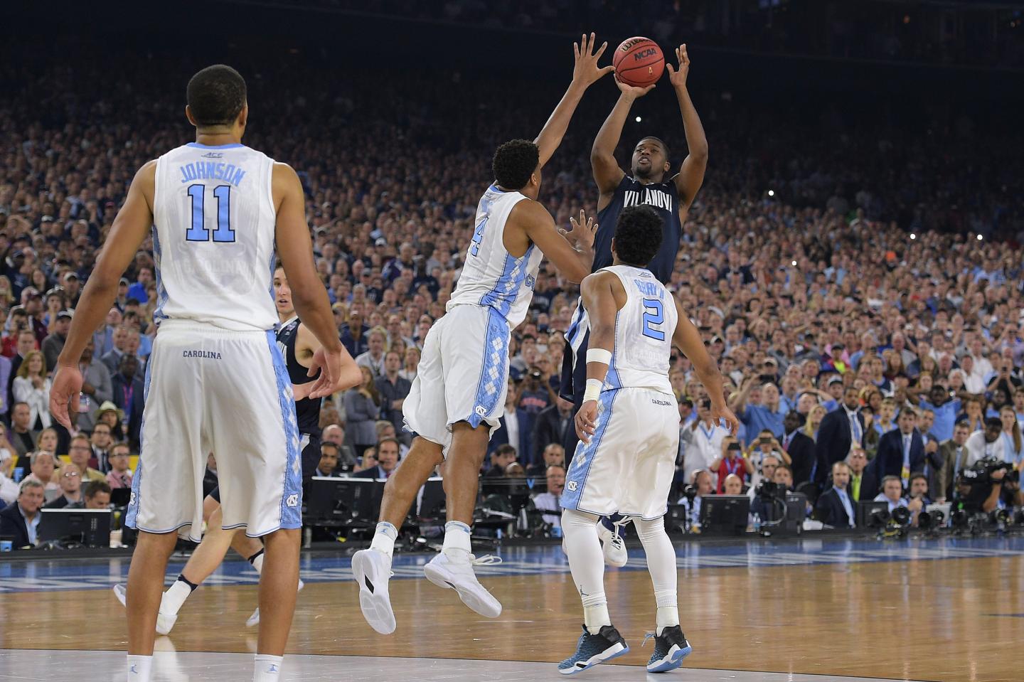HOUSTON, TX - APRIL 04: Kris Jenkins #2 of the Villanova Wildcats puts up the game-winning three-point shot as time expires against the North Carolina Tar Heels during the 2016 NCAA Men's Final Four Championship at NRG Stadium on April 04, 2016 in Houston, Texas. (Photo by Lance King/Getty Images)