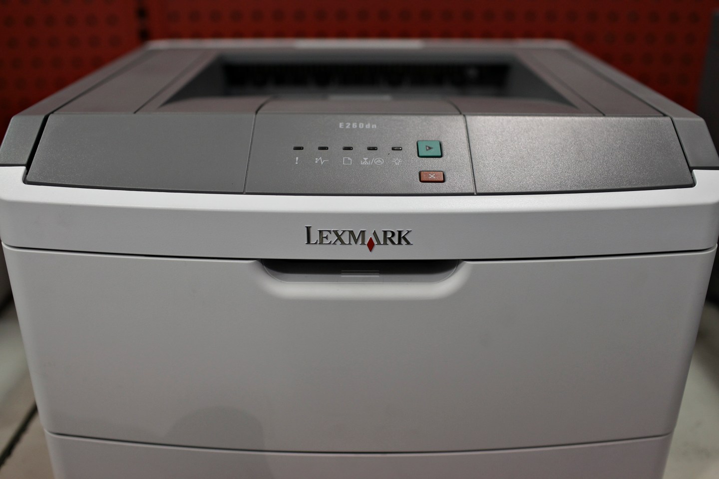 A Lexmark laser printer sits on display inside a Staples sto