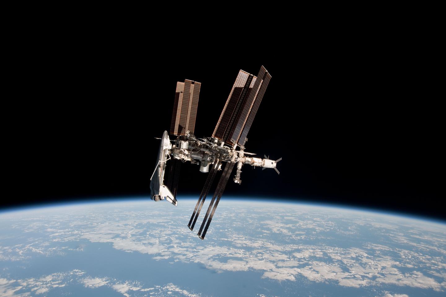 Endeavour Orbits Earth Docked To International Space Station