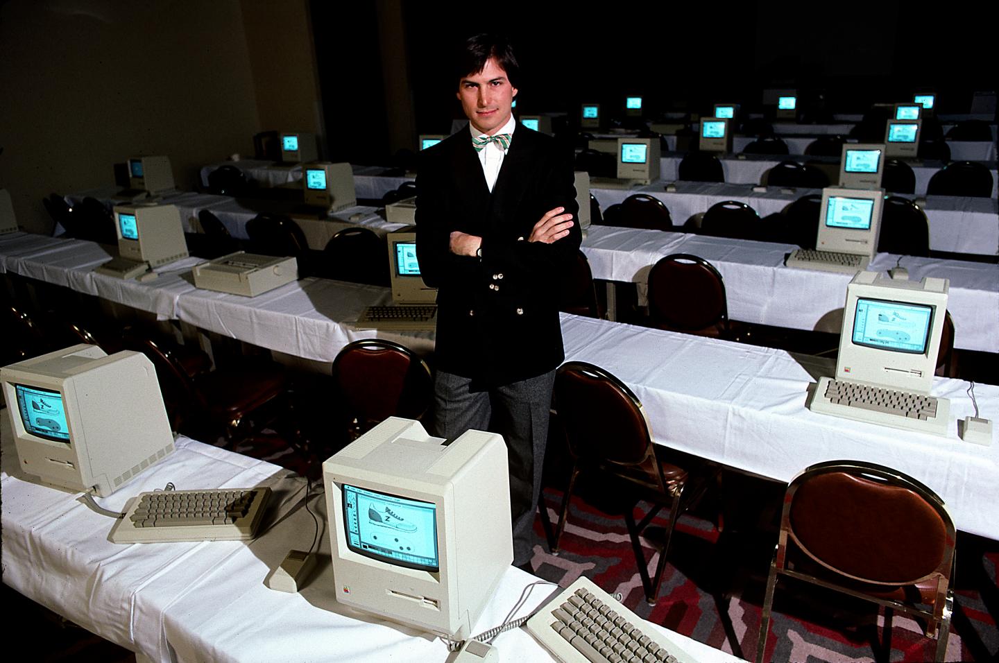 Caption:Steve Jobs with room full of computers, 1984. (Photo by Michael L Abramson/Getty Images)
