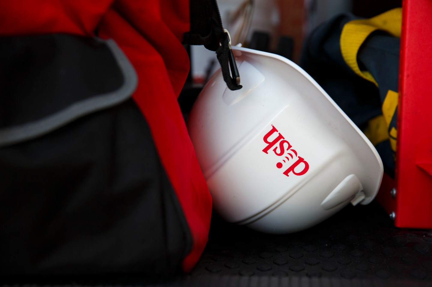 The Dish Network Corp. logo is displayed on a hard hat during a installation in Paramount, California, U.S., on Tuesday, November 3, 2015. Photographer: Patrick T. Fallon/Bloomberg