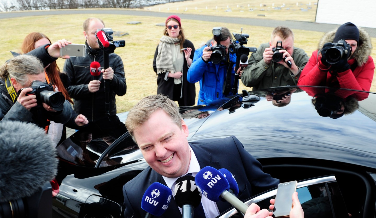 Iceland's Prime Minister Gunnlaugsson speaks to media outside Iceland president's residence in Reykjavik