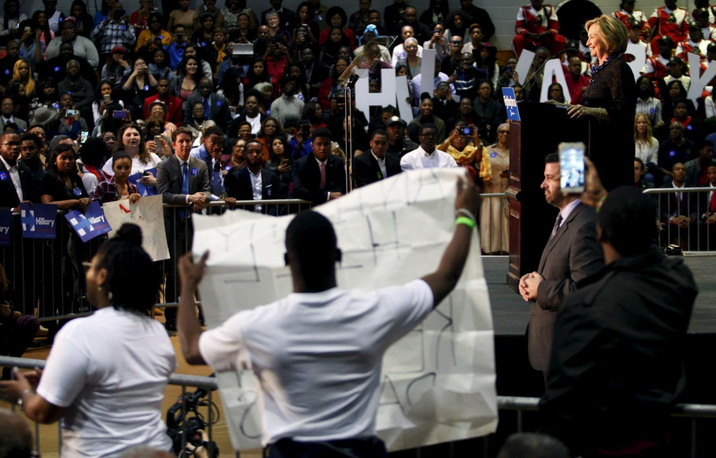 U.S. Democratic presidential candidate Hillary Clinton speaks at the "African Americans for Hillary" rally as protesters from "Black Lives Matter" interrupt her speech at Clark Atlanta University in Atlanta, Georgia