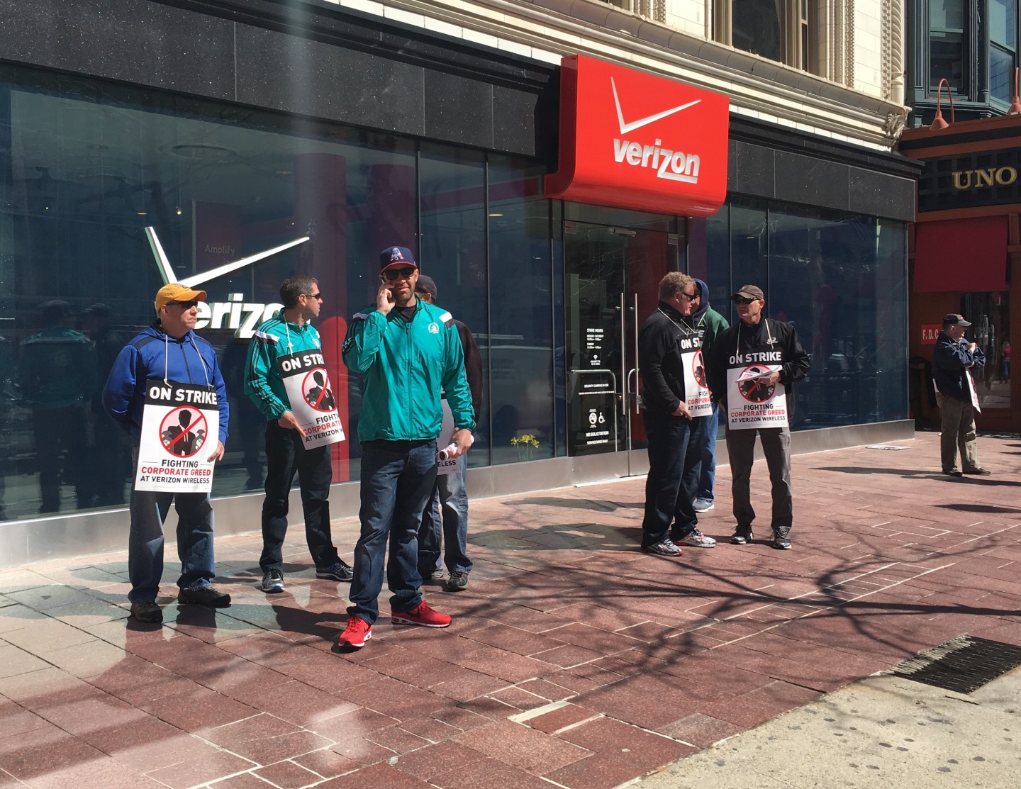 Striking Verizon workers on a picket line