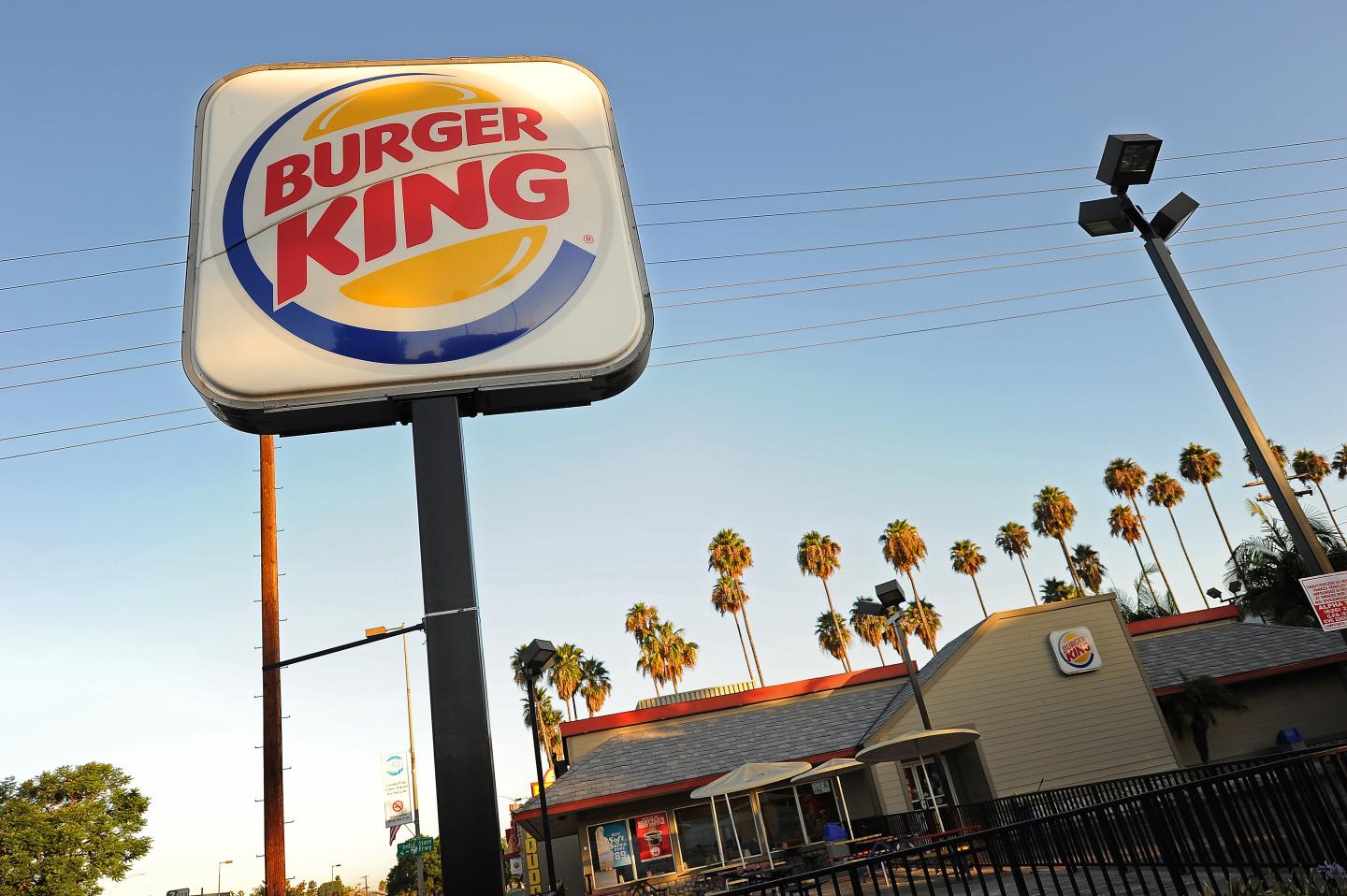 A Burger King sign outside a restaurant