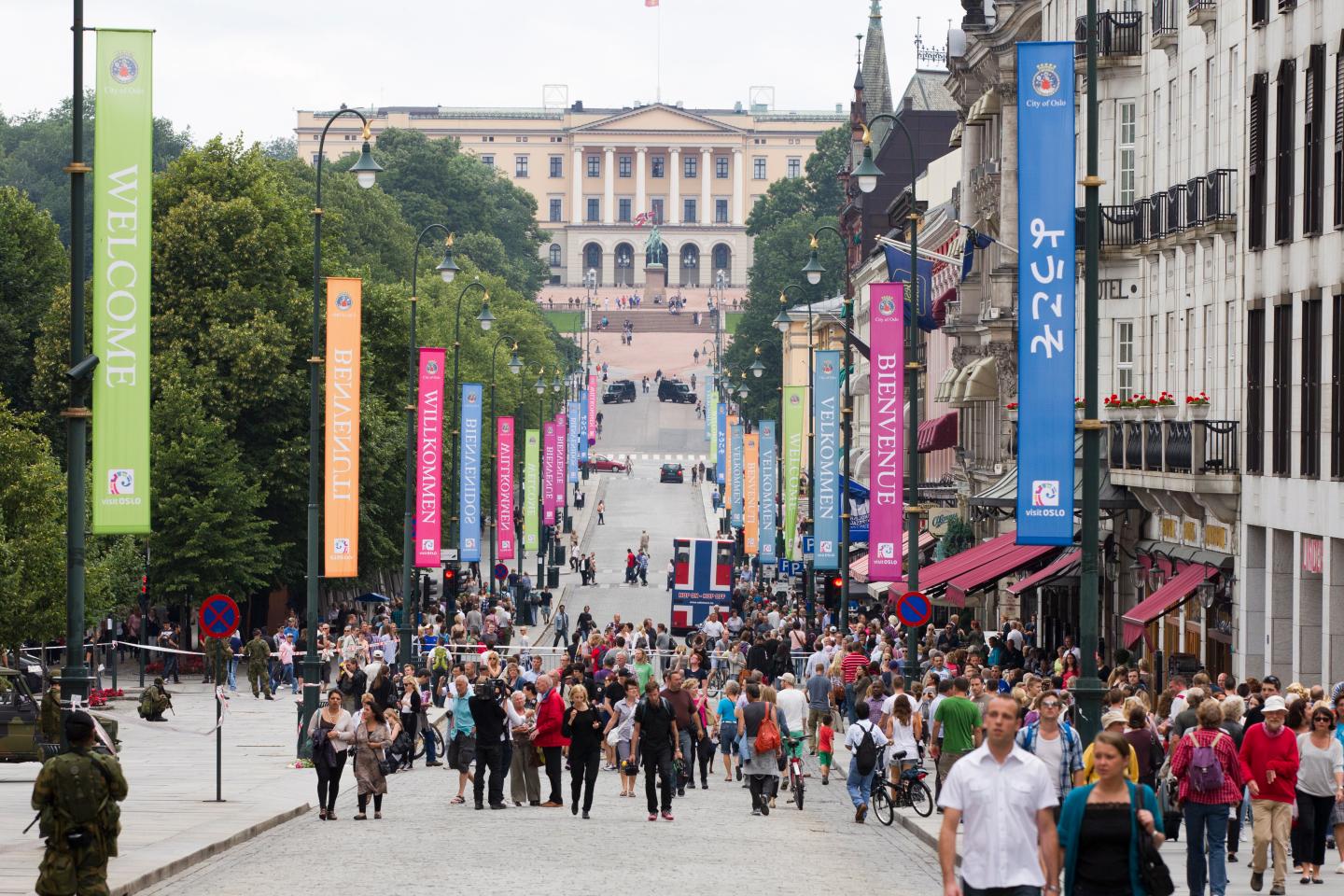 People walk in the main street of Oslo,