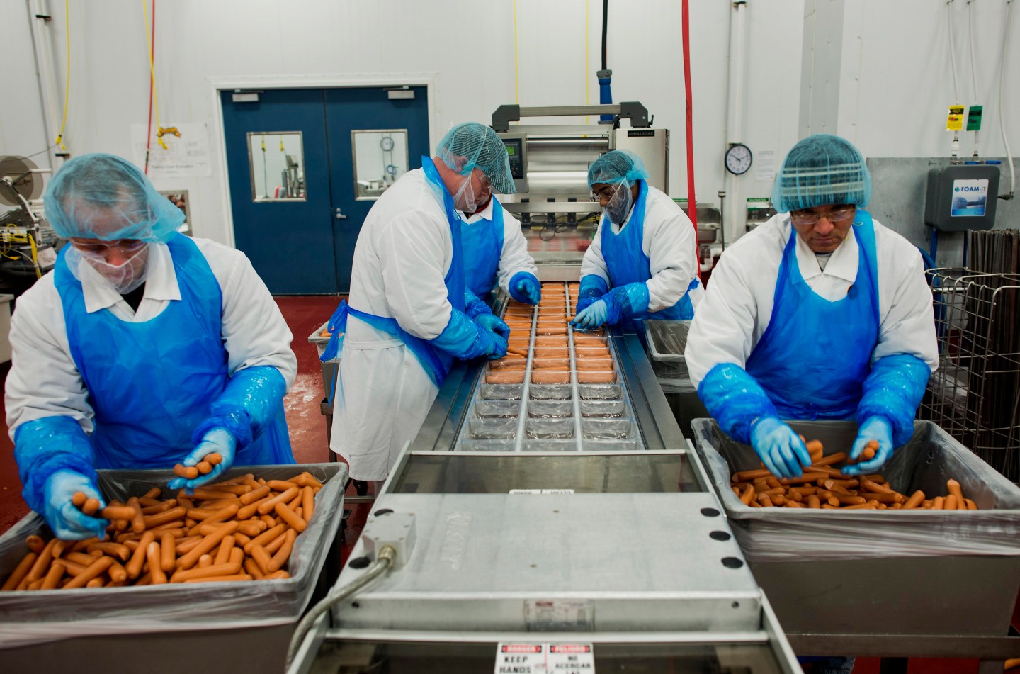 Hot Dog Production At Smith Provisions Co. As US Beef And Pork Exports Fall