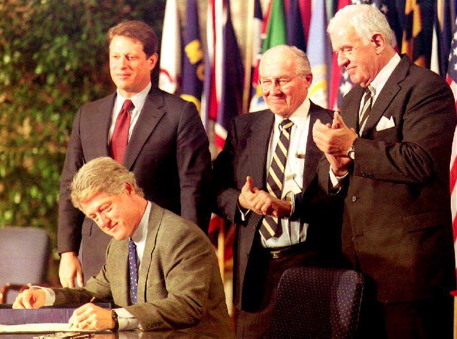 U.S. President Bill Clinton signs the North Americ