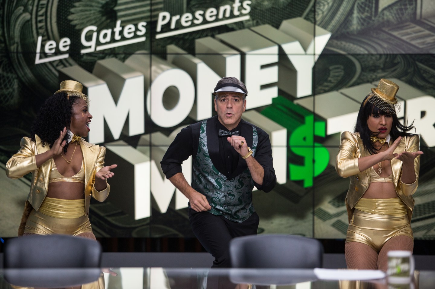 George Clooney (center) stars as Lee Gates in TriStar Pictures' MONEY MONSTER.