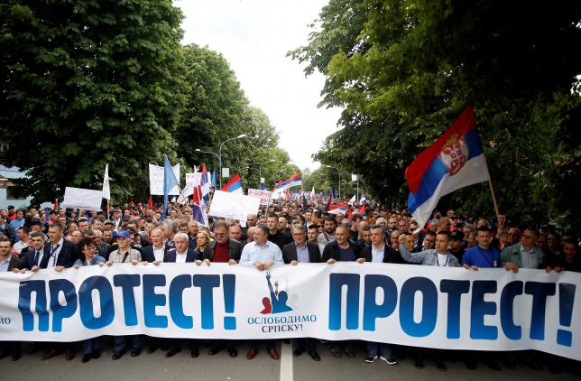People take part in an anti-government protest in Banja Luka