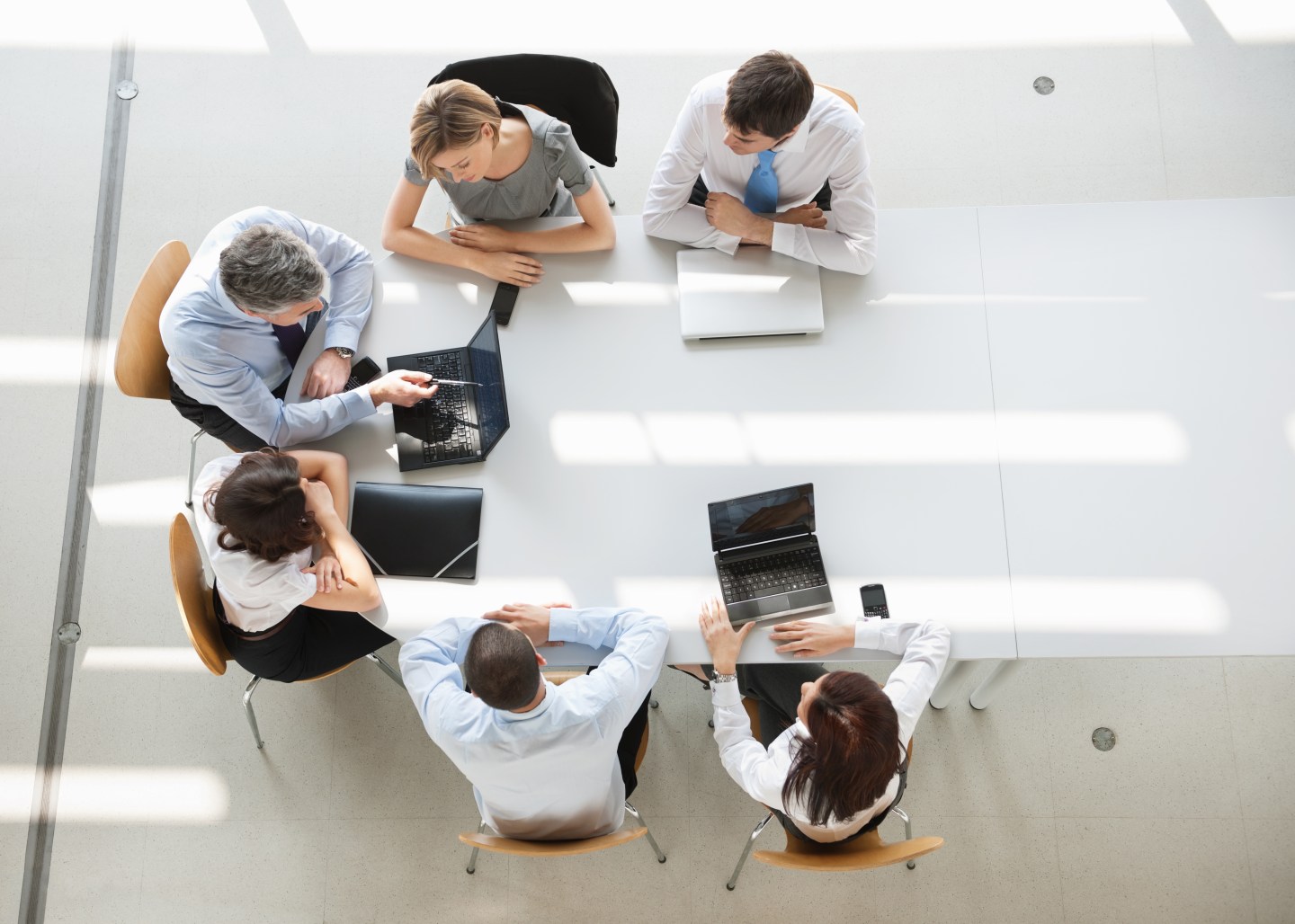 Overhead view of business people in a meeting