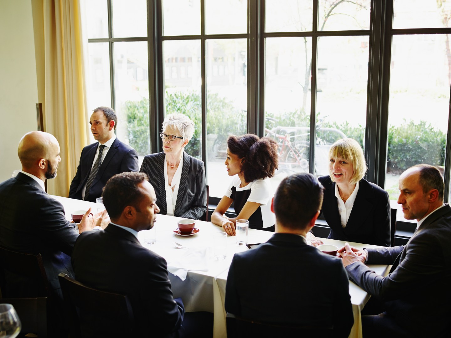 Group of business people meeting in restaurant