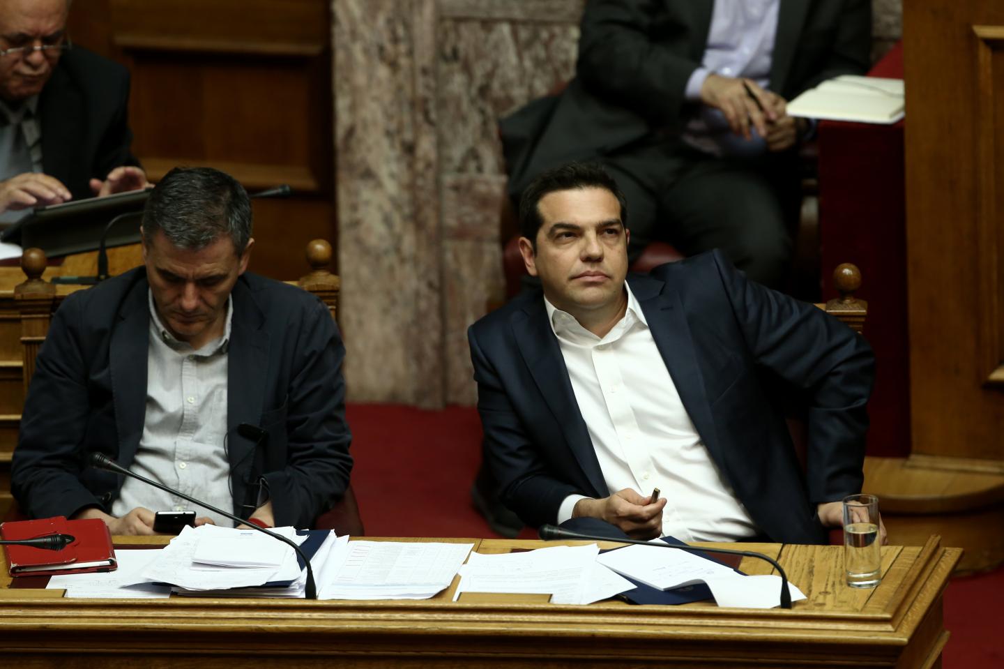 Greek PM Alexis Tsipras (R) and Greek Finance Minister