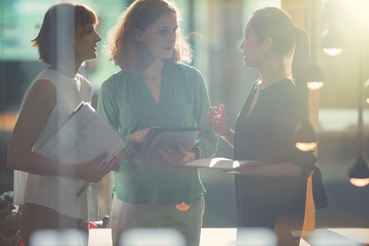 Businesswomen talking in office