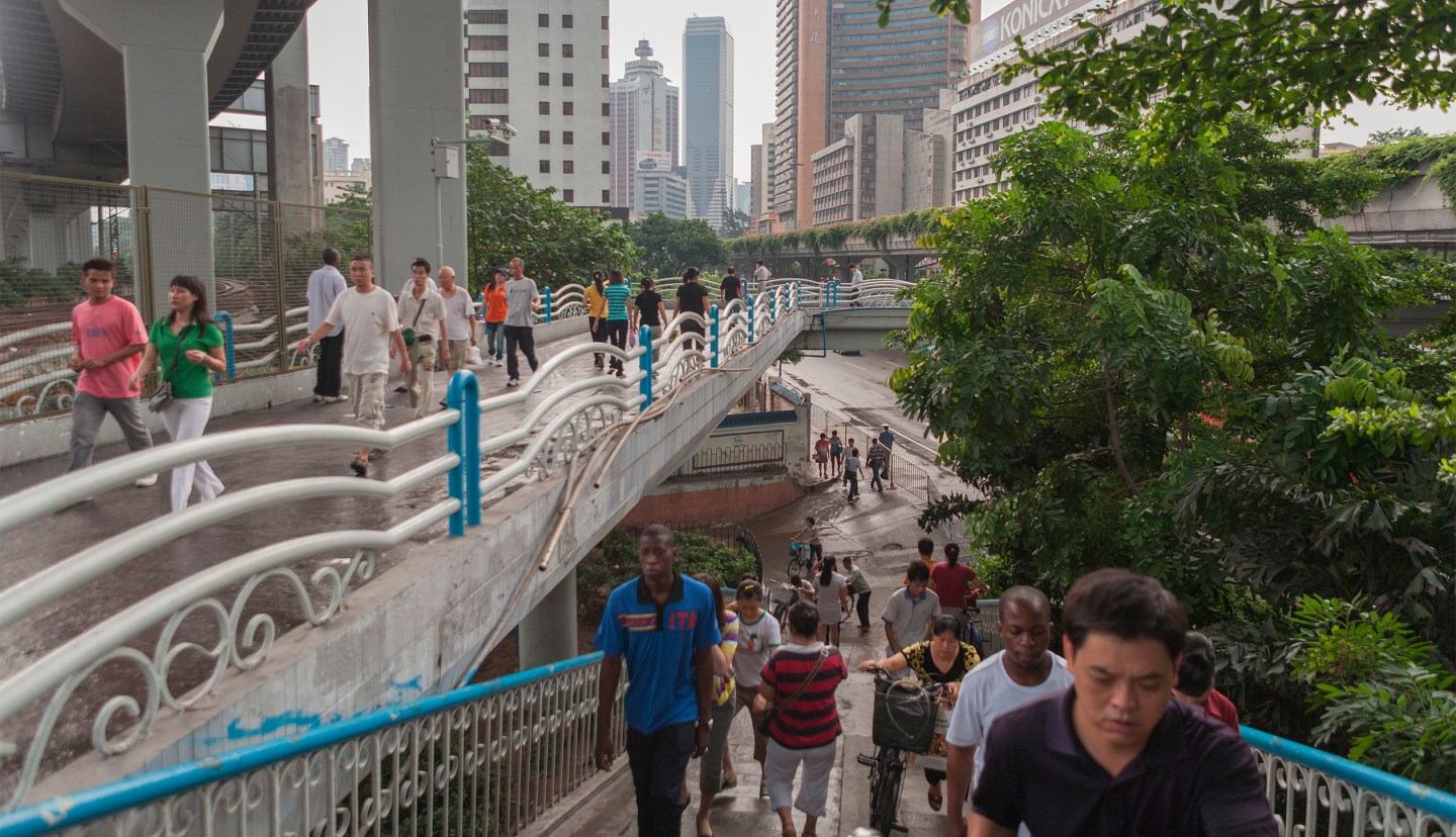The pedestrian bridge, July 30, 2009
from the book Little Road North: Africa in China by Daniel Traub, published by Kehrer Verlag, 2016