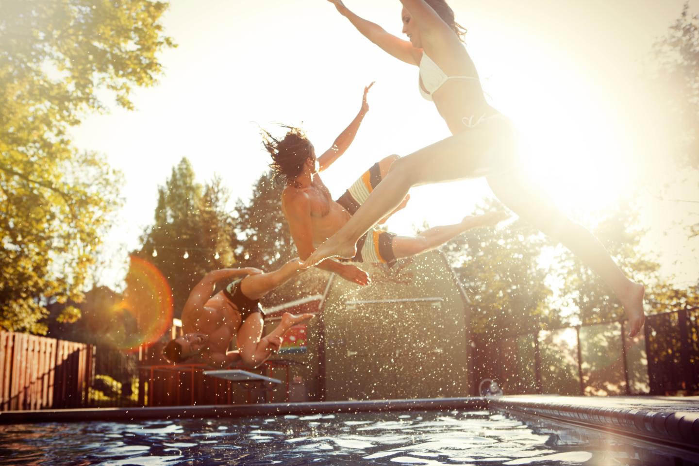 Three friends enjoying a day at the pool.
